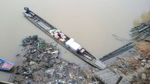 We used this boat to carry the bags to the village